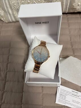 Nine West  Gold Bracelet Watch with Glitter Blue Dial